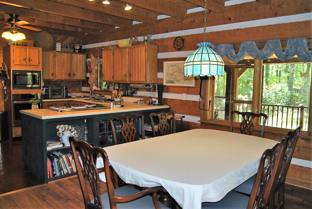 249 Bolingview Road Juliette, GA 31046 - Photo 25 of 45 a view of a dining room with furniture window and outside view