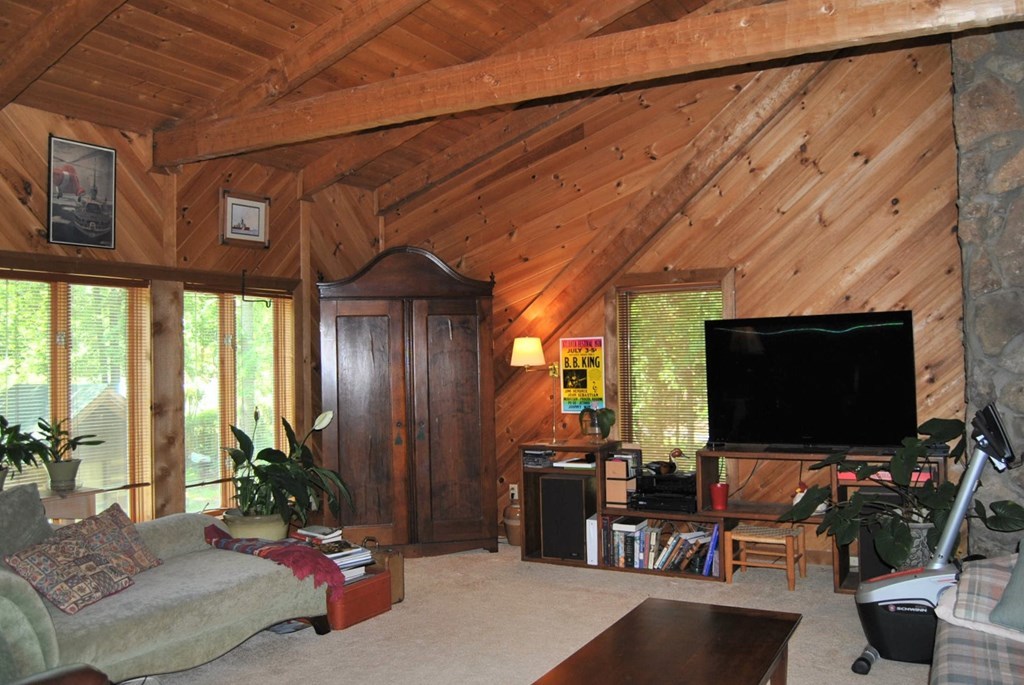 249 Bolingview Road Juliette, GA 31046 - Photo 29 of 45 a living room with patio furniture and a flat screen tv