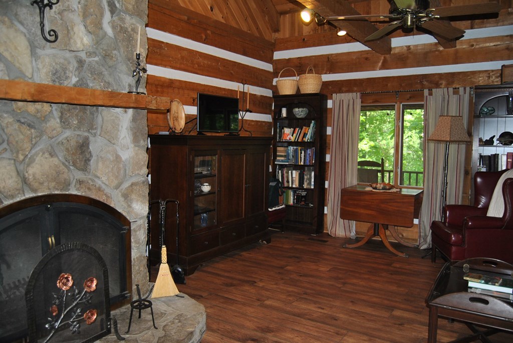 249 Bolingview Road Juliette, GA 31046 - Photo 40 of 45 a living room with furniture and a fireplace