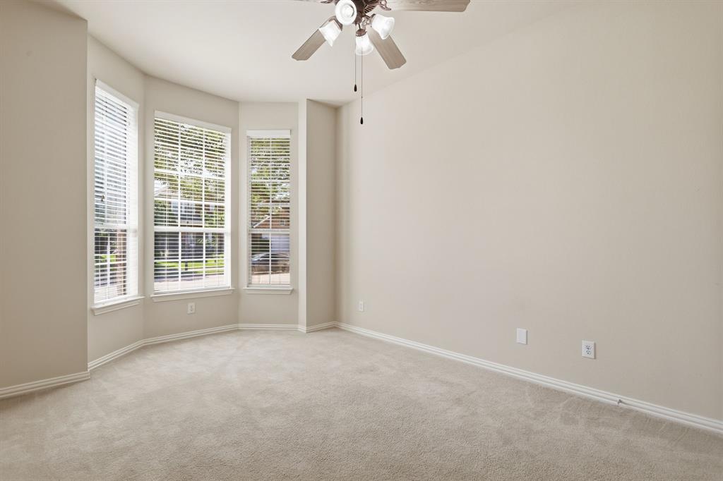 559 Reed Drive Fate, TX 75087 - Photo 21 of 40 downstairs bedroom 2