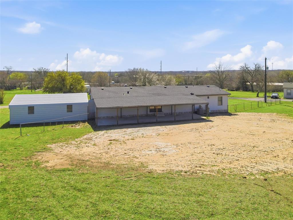 960 Pecan Street Azle, TX 76020 - Photo 27 of 34 a view of a big yard with an outdoor seating