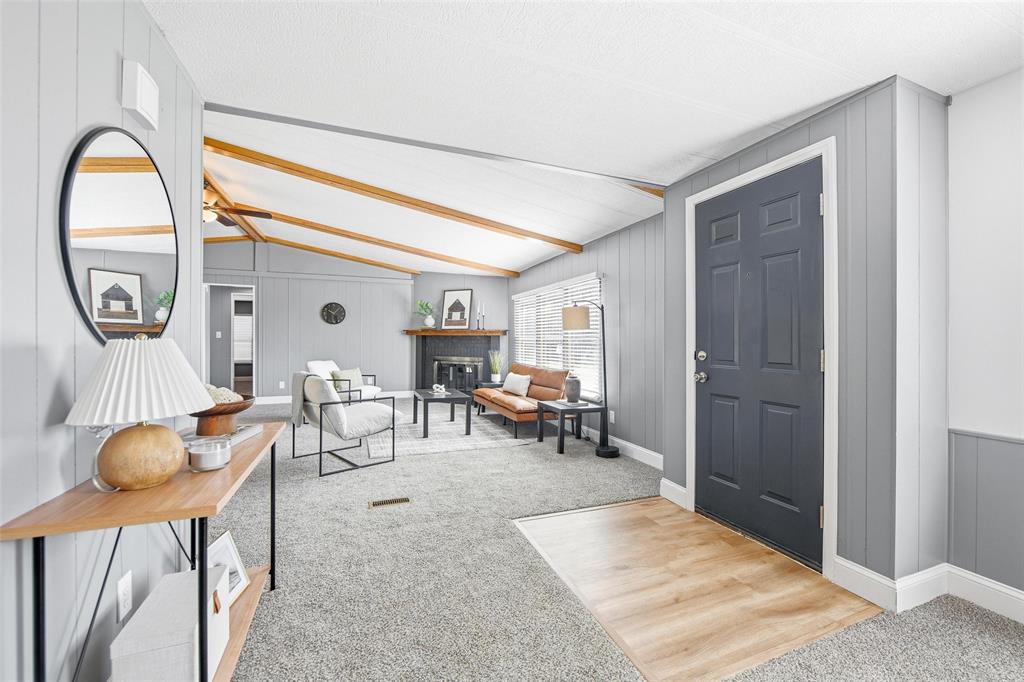 960 Pecan Street Azle, TX 76020 - Photo 4 of 34 a living room with furniture a dining table and a large window