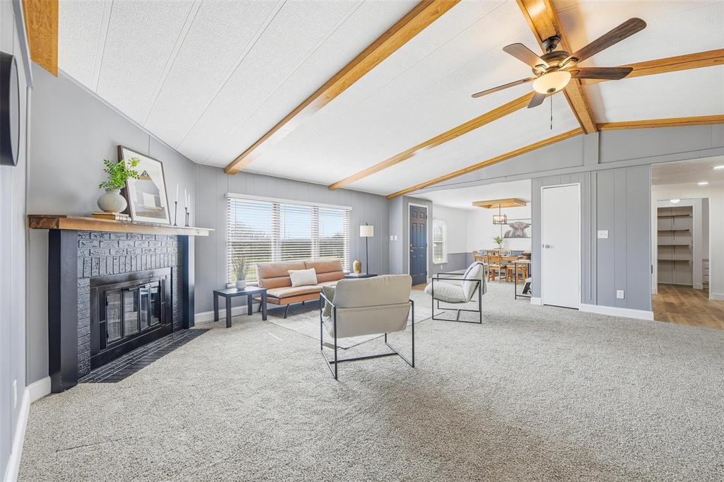 960 Pecan Street Azle, TX 76020 - Photo 6 of 34 a living room with furniture and a fireplace