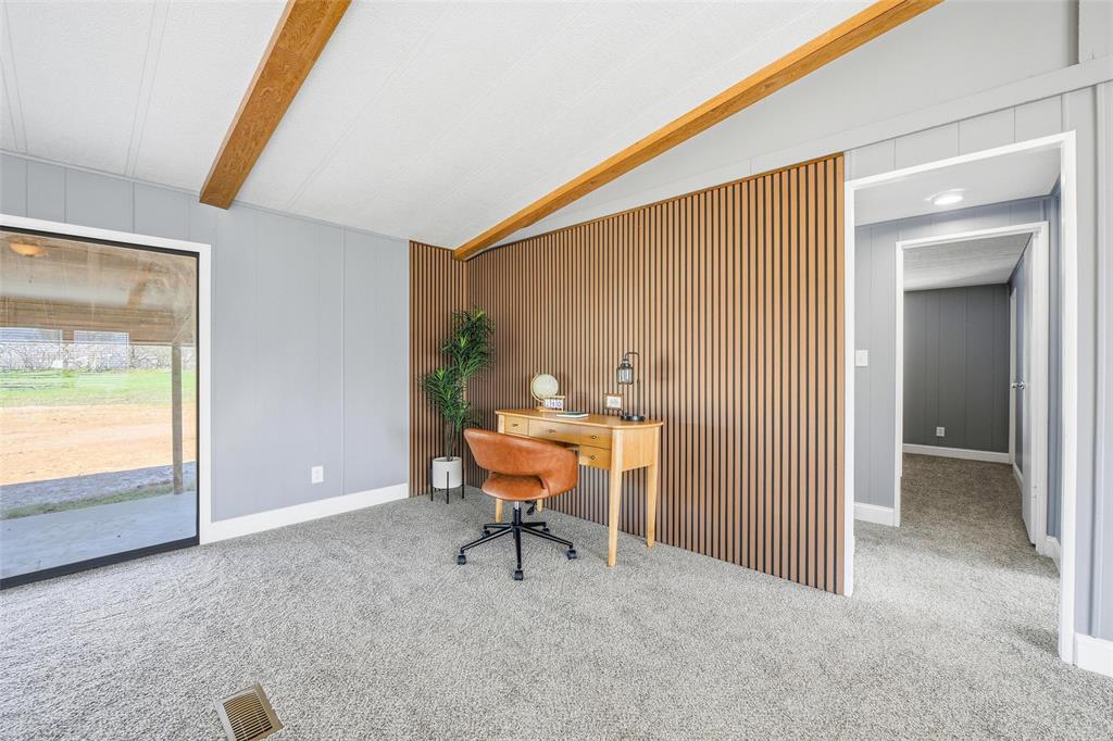 960 Pecan Street Azle, TX 76020 - Photo 8 of 34 a backyard of a house with table and chairs