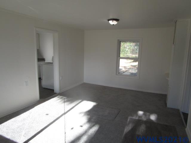 6912 Liberty Road South Salem, OR 97306 - Photo 2 of 37 a view of an empty room and window