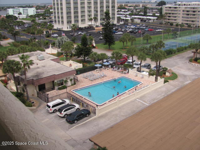 1830 North Atlantic Avenue, Unit C102 Cocoa Beach, FL 32931 - Photo 13 of 21 an aerial view of a house with garden space and lake view