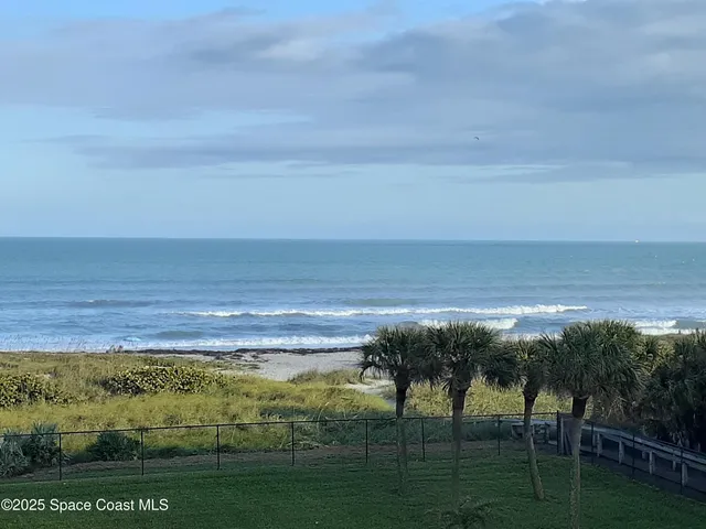 a view of an ocean from a balcony