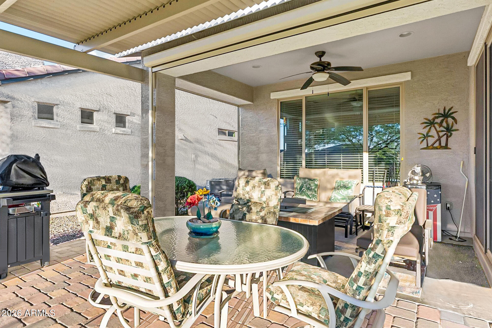 16632 South 175th Drive Goodyear, AZ 85338 - Photo 12 of 22 a dining room with furniture a chandelier and window