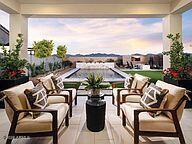 16632 South 175th Drive Goodyear, AZ 85338 - Photo 20 of 22 a view of a patio with furniture and a potted plant