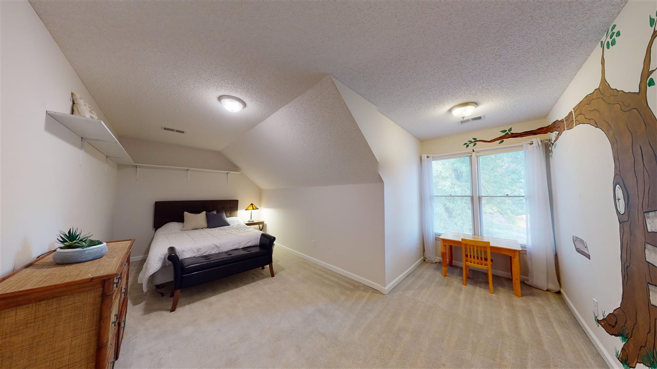 719 Gable Lane Collierville, TN 38017 - Photo 16 of 25 a bed room with a bed and a window