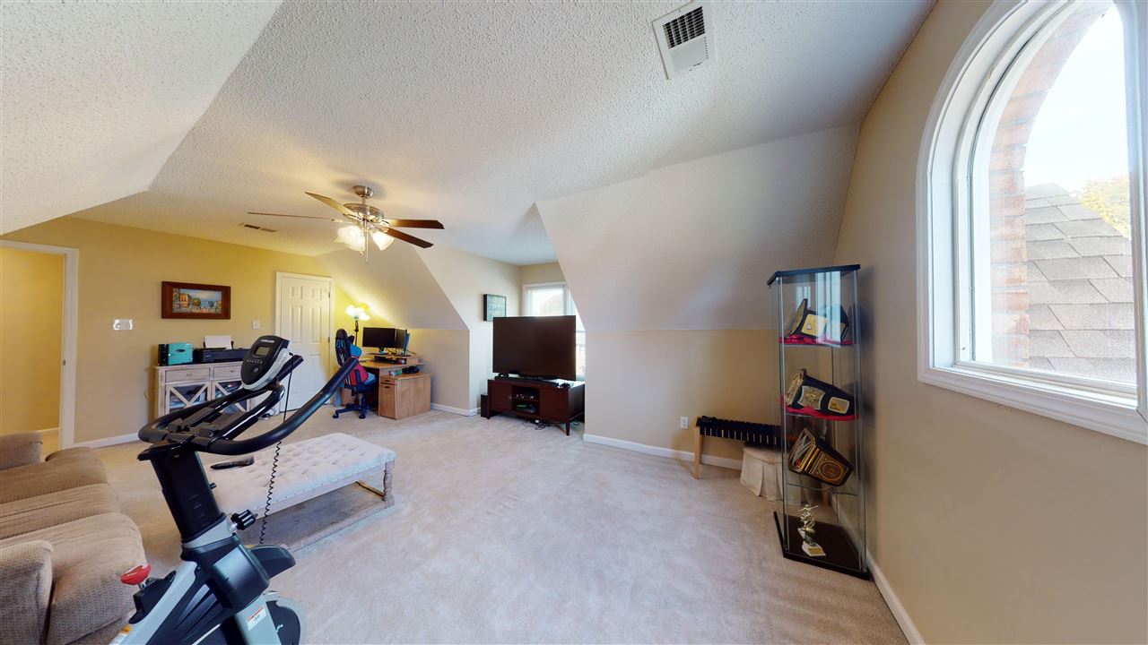 719 Gable Lane Collierville, TN 38017 - Photo 20 of 25 a view of a workspace with furniture and a window