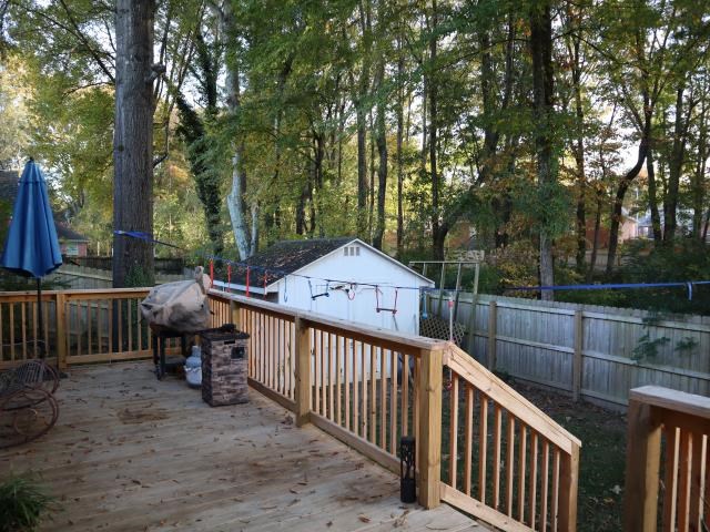 719 Gable Lane Collierville, TN 38017 - Photo 22 of 25 a view of a deck with a backyard