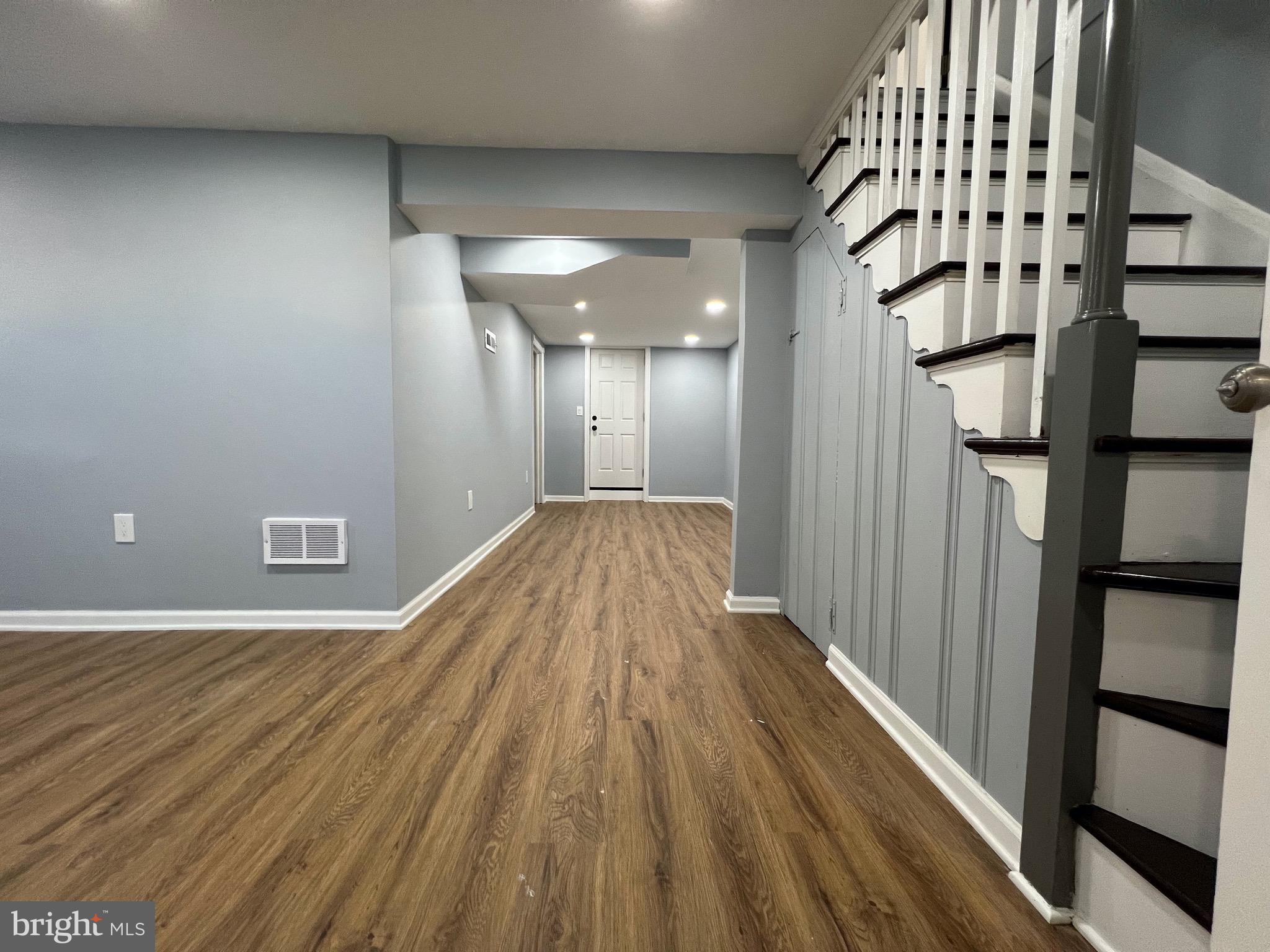 1719 Ramblewood Road Baltimore, MD 21239 - Photo 20 of 25 Basement exits to rear walkout stairs