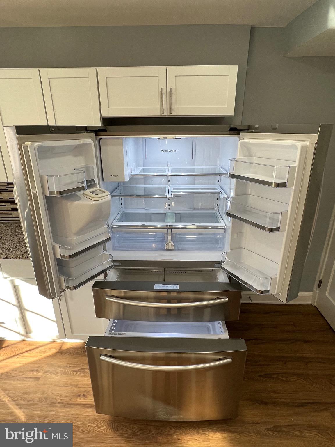 1719 Ramblewood Road Baltimore, MD 21239 - Photo 3 of 25 Wow! Oversized Stainless Steel Refrigerator