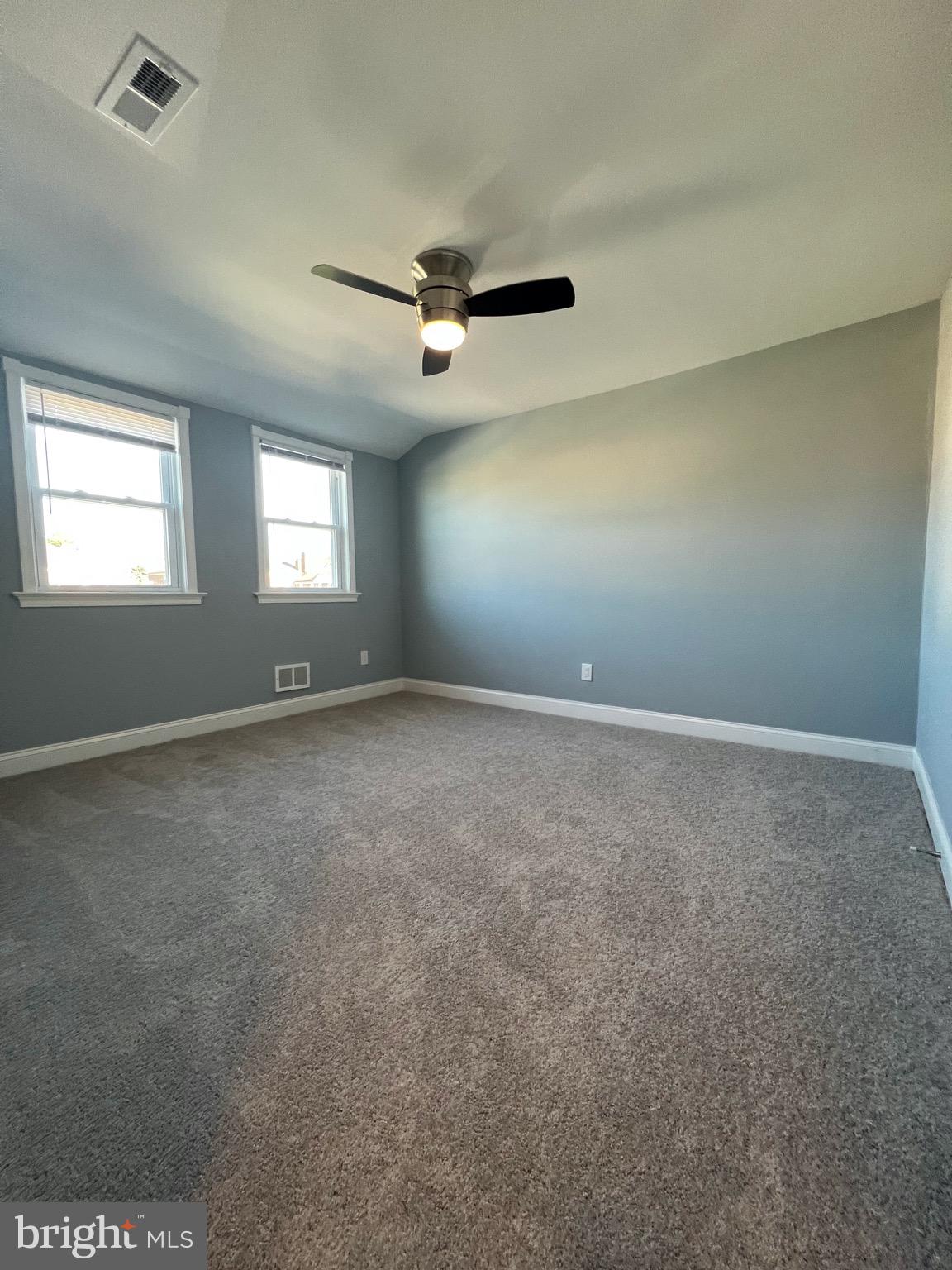 1719 Ramblewood Road Baltimore, MD 21239 - Photo 10 of 25 Bedroom 1 - original hardwood under warm carpet