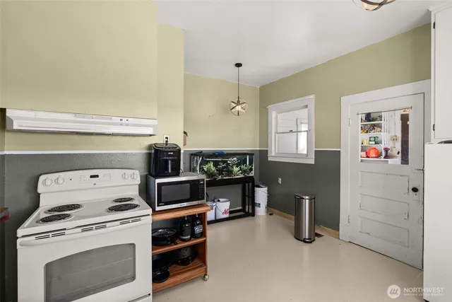 a view of kitchen and sink