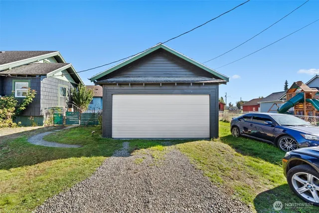 a view of a car parked in front of house