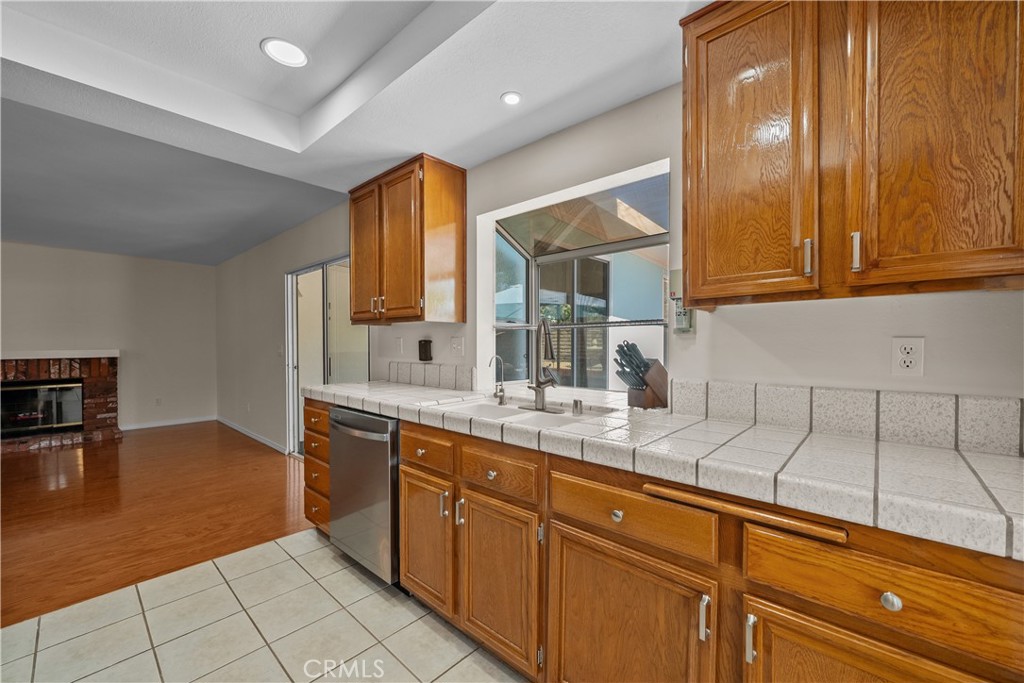 28501 Victoria Road Castaic, CA 91384 - Photo 11 of 45 a kitchen with sink cabinets and window