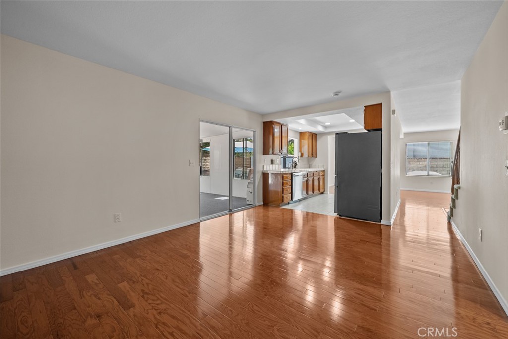 28501 Victoria Road Castaic, CA 91384 - Photo 16 of 45 a view of a kitchen with a refrigerator a stove top oven and a refrigerator