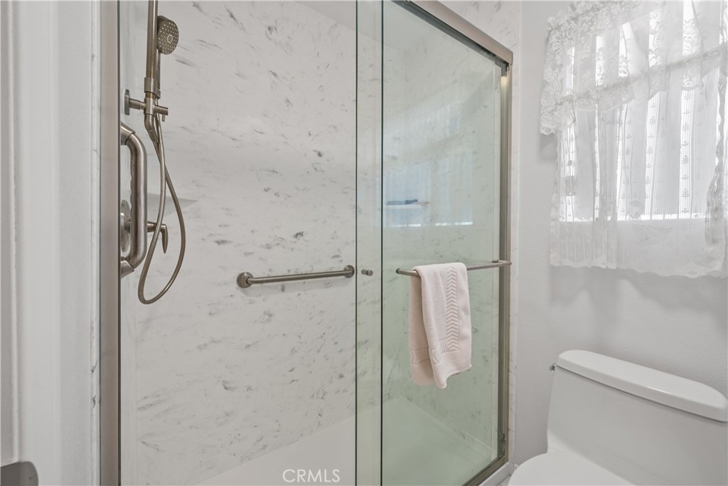 28501 Victoria Road Castaic, CA 91384 - Photo 24 of 45 a bathroom with a shower and toilet