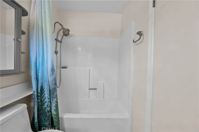 a view of house with yard and swimming pool