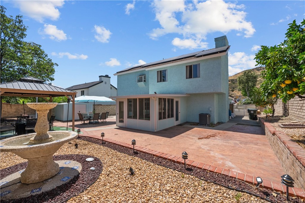 28501 Victoria Road Castaic, CA 91384 - Photo 31 of 45 a view of a patio with a table and chairs