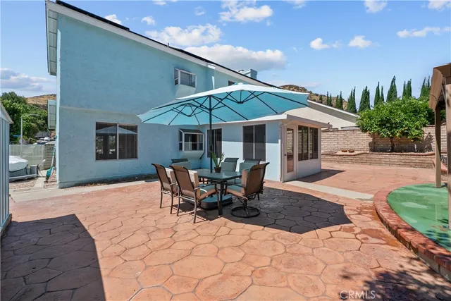 a view of a porch with seating space