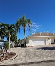 6310 Cocoa Lane Apollo Beach, FL 33572 - Photo 2 of 19 a view of a house with a yard