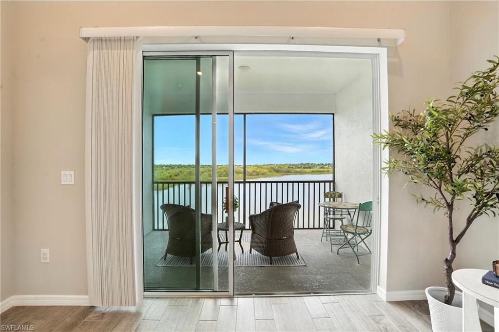 a glass door with a glass door and shower