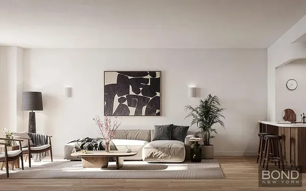 a bedroom with a bed and a couch