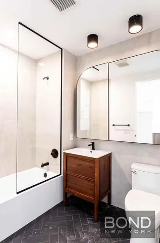 a view of a workspace with furniture