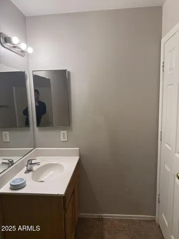 a bathroom with a sink and a toilet