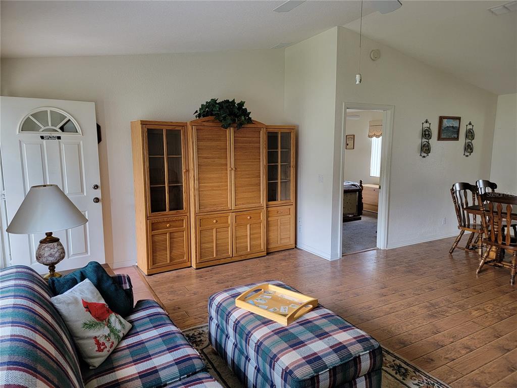 10269 Southwest 63rd Avenue Ocala, FL 34476 - Photo 16 of 48 a bedroom with furniture and a window