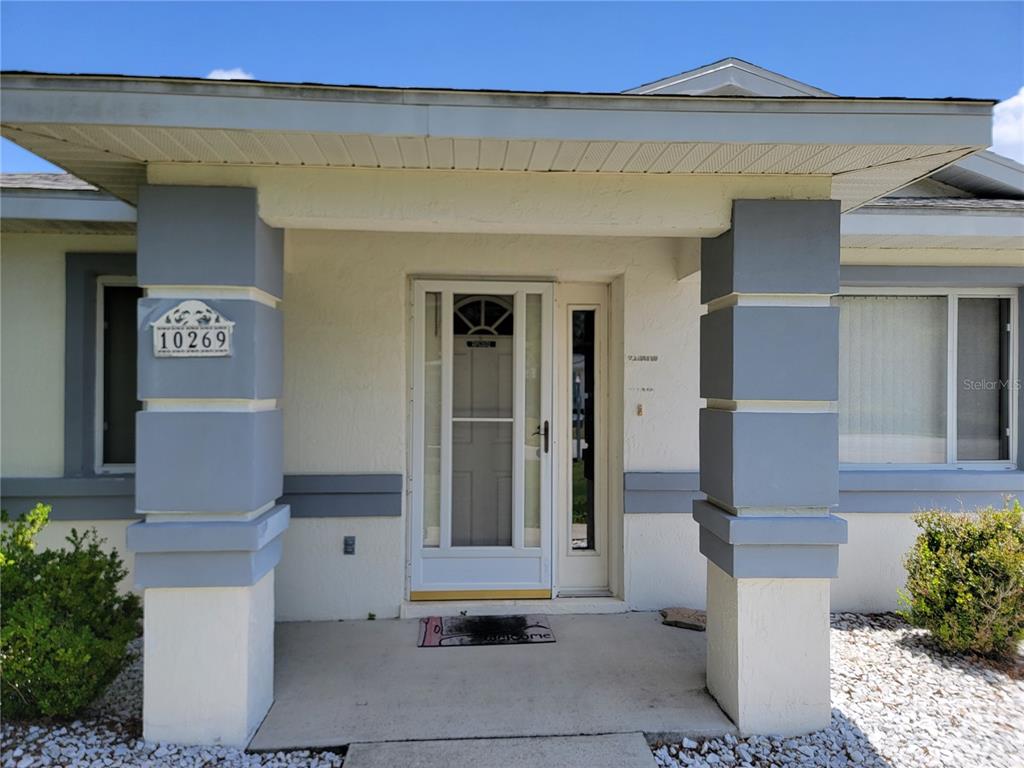 10269 Southwest 63rd Avenue Ocala, FL 34476 - Photo 4 of 48 a front view of a house