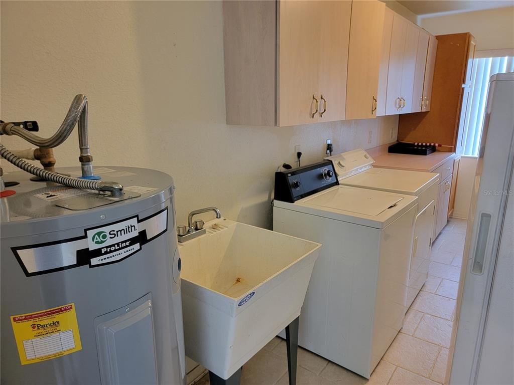 10269 Southwest 63rd Avenue Ocala, FL 34476 - Photo 41 of 48 a utility room with dryer and washer
