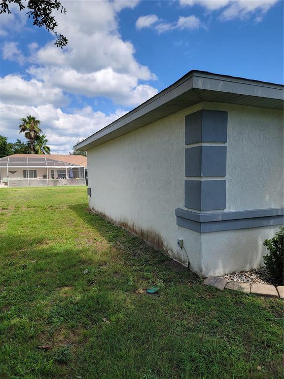 10269 Southwest 63rd Avenue Ocala, FL 34476 - Photo 5 of 48 a view of an house with backyard space and balcony