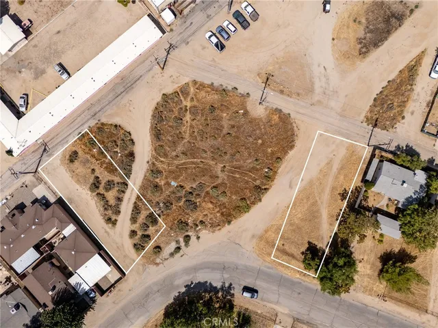 a view of city street with a houses