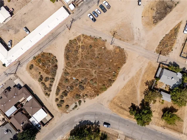 a view of a town with mountains in the background