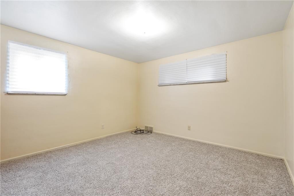 490 Ridgemont Drive Pittsburgh, PA 15220 - Photo 7 of 25 Light and bright primary bedroom with new carpet!