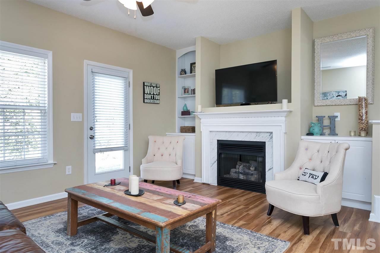 2049 Persimmon Ridge Drive Raleigh, NC 27604 - Photo 4 of 15 Another view of the family room shows why it is ideal for entertaining or just relaxing after a day at the Hedingham golf course, working out at the Fitness Center, or working on your serve at the tennis courts!