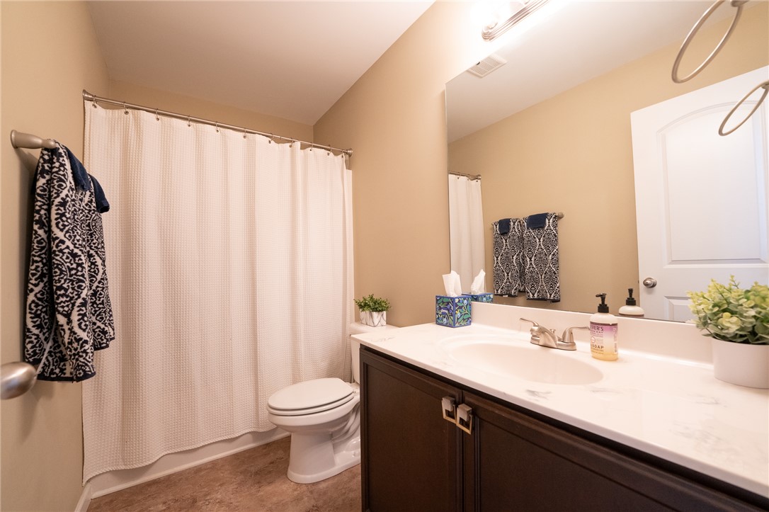 1012 Whirlaway Circle Anderson, SC 29621 - Photo 19 of 25 A well-appointed bathroom features a single vanity with ample counter space and a convenient shower-tub combination.