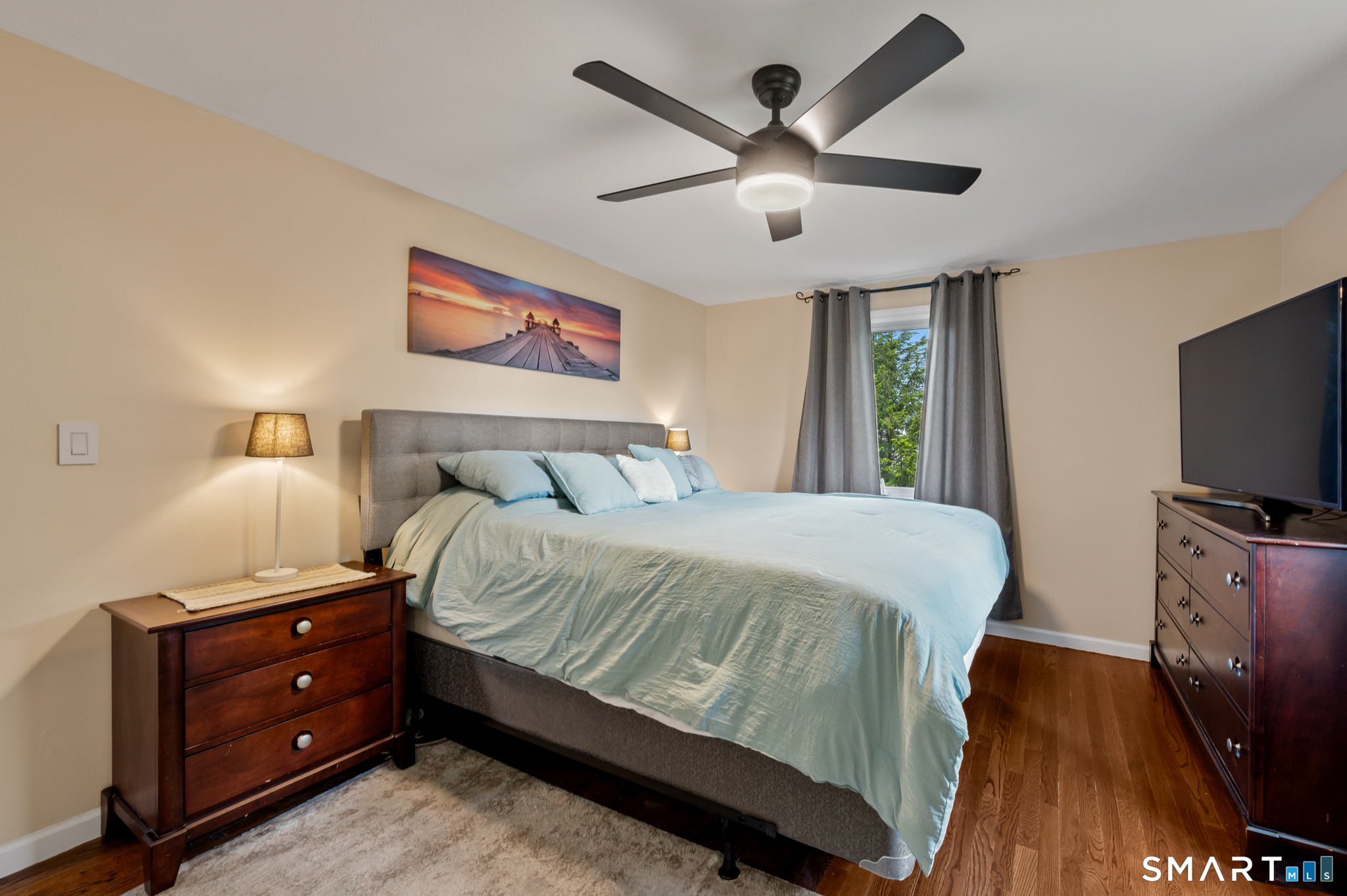 201 Ridge Crest Circle Wethersfield, CT 06109 - Photo 12 of 35 a bedroom with a bed and a flat screen tv