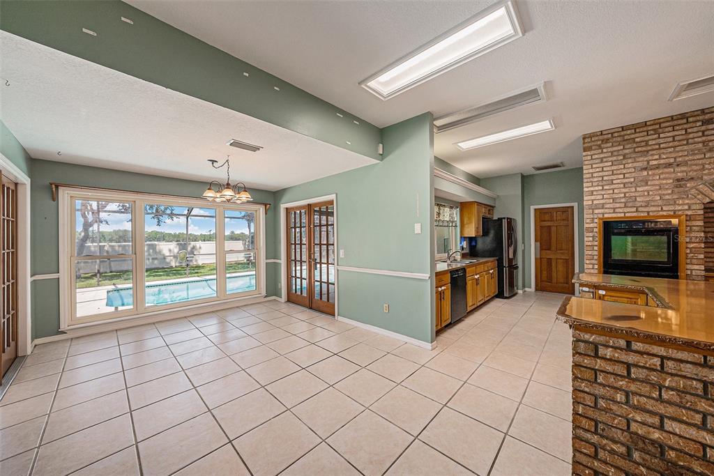 3018 Colonial Ridge Drive Brandon, FL 33511 - Photo 12 of 36 a living room with furniture and a flat screen tv