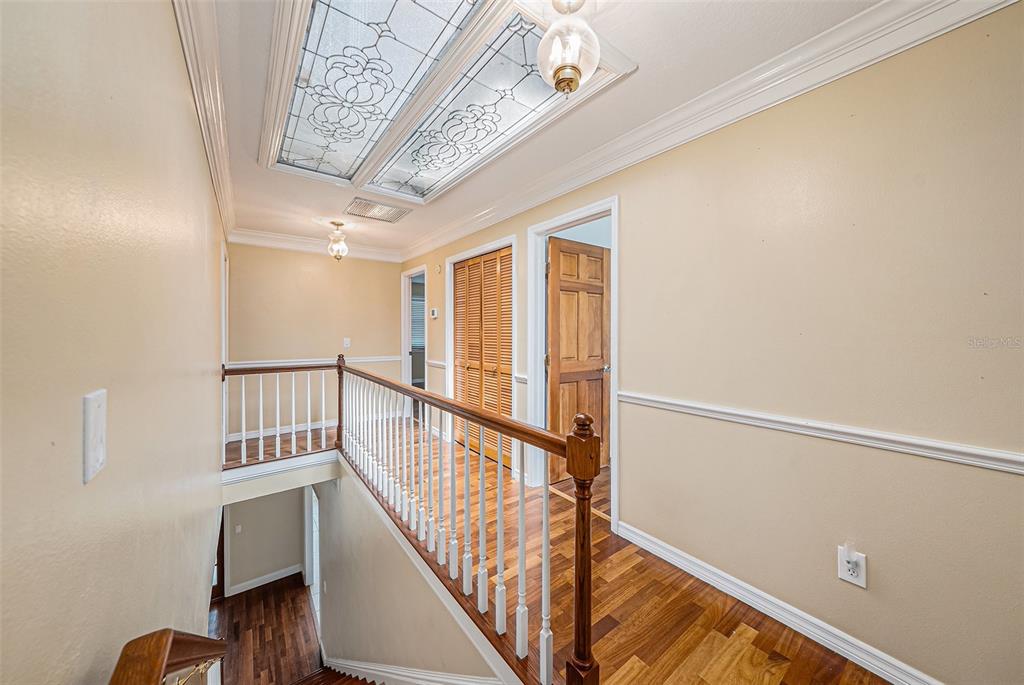 3018 Colonial Ridge Drive Brandon, FL 33511 - Photo 19 of 36 a view of entryway with wooden floor