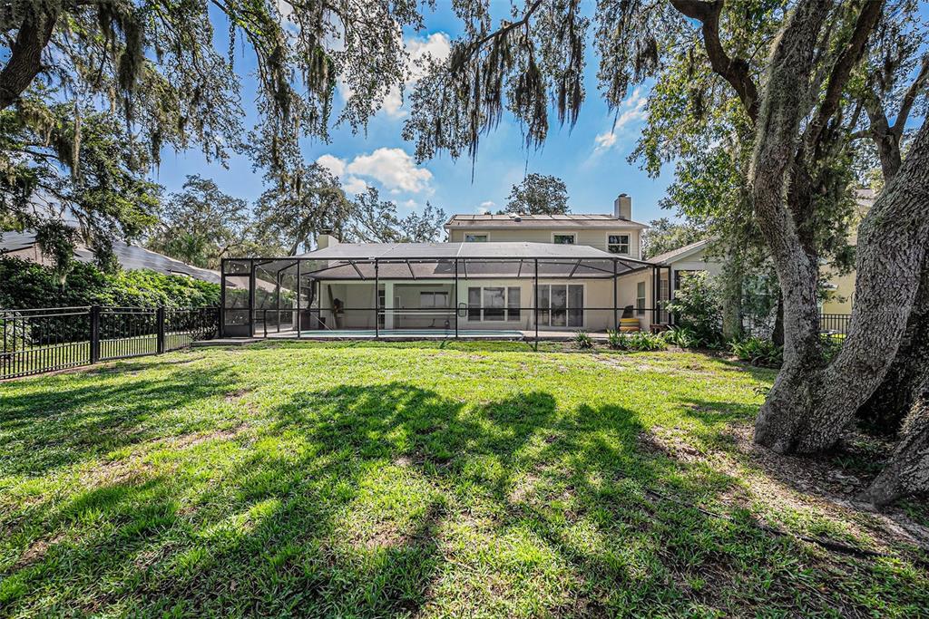 3018 Colonial Ridge Drive Brandon, FL 33511 - Photo 35 of 36 a view of house with a garden