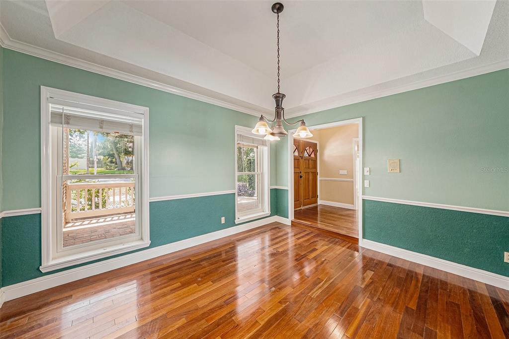 3018 Colonial Ridge Drive Brandon, FL 33511 - Photo 5 of 36 a view of empty room with wooden floor and fan