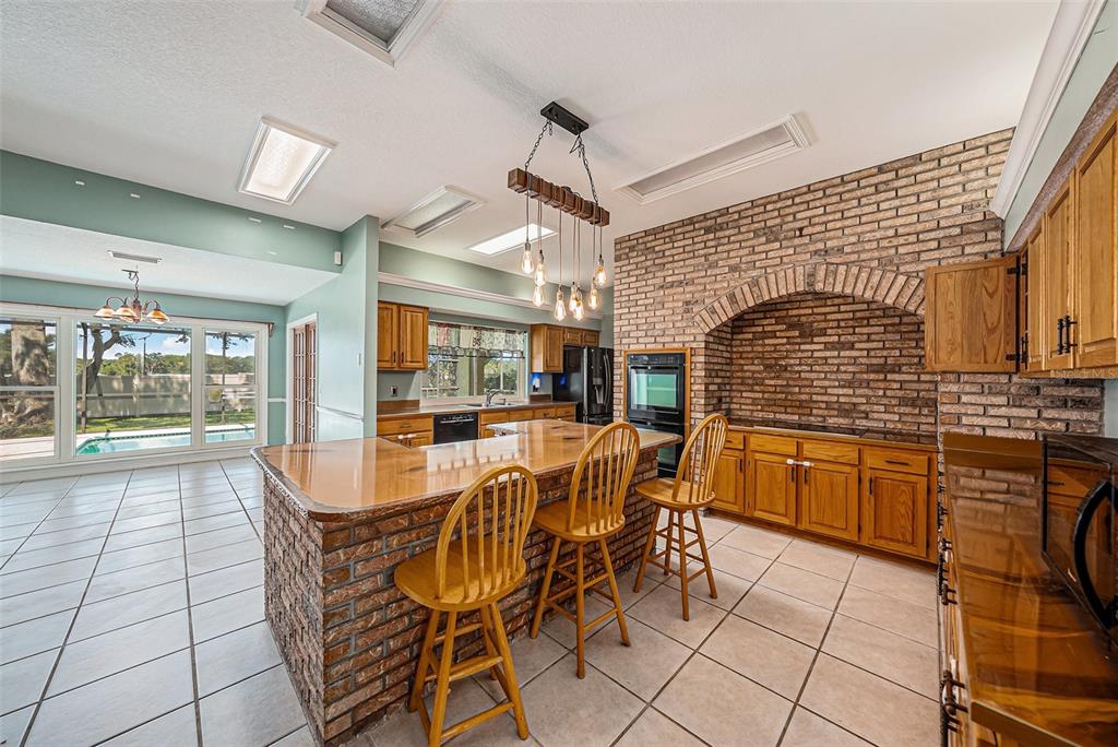 3018 Colonial Ridge Drive Brandon, FL 33511 - Photo 9 of 36 a dining room with furniture and window