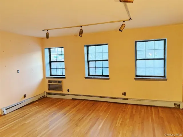 a view of a kitchen with a refrigerator
