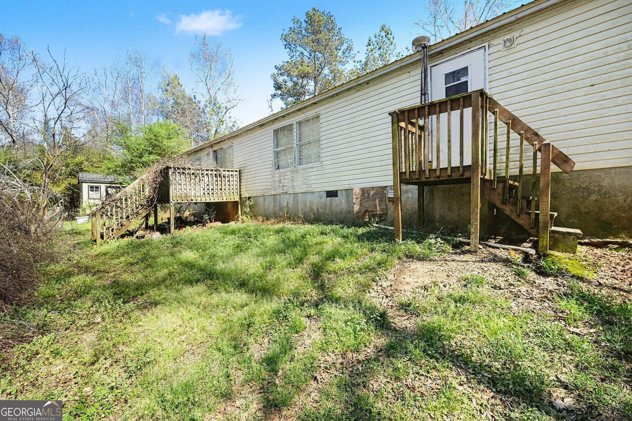 109 Mill Run Comer, GA 30629 - Photo 22 of 23 a view of a house with a yard