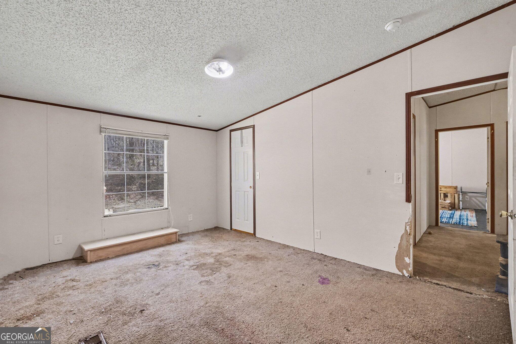 109 Mill Run Comer, GA 30629 - Photo 3 of 23 a view of an empty room with a window